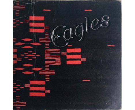 EAGLES SIGNED PROGRAMME. A 1976 Eagles tour programme signed to inner pages by Glenn Frey, Don Henley, Randy Meisner, Don Fel