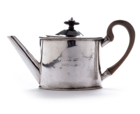 A George V silver teapot, by Goldsmiths and Silversmiths Co Ltd, of plain oval form, with beaded rims and engraved crest of a