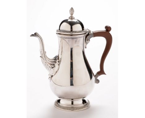 An Elizabeth II silver coffee pot, by Barker Ellis Silver Co, Birmingham 1969, of baluster form with gadrooned rims and acorn