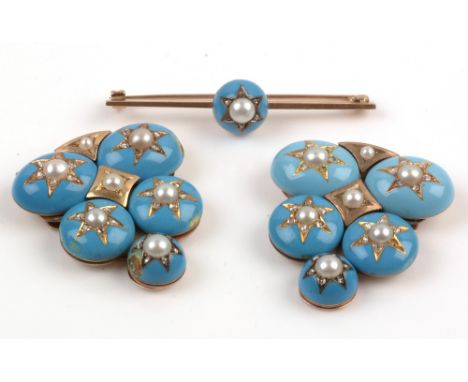 A pair of turquoise enamel fur clips, with roundels centered by half pearls within rose-cut diamond star setting, yellow meta