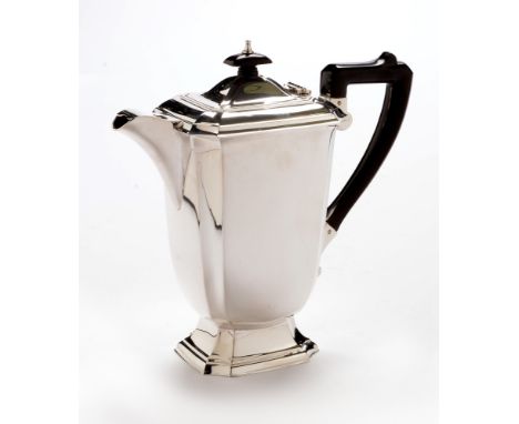 A George V silver hot water jug, by Elkington &amp; Co, Birmingham 1936, of canted rectangular form with ebonised handle and 