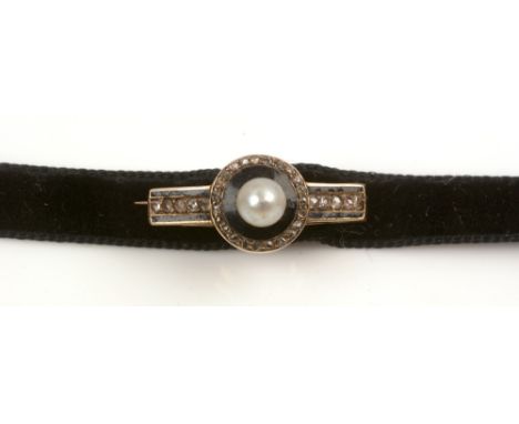 A Victorian pearl, enamel and diamond mourning brooch, the centre set with a single pearl within black enamel and rose-cut di