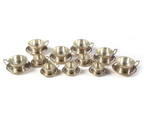 A set of six Austro-Hungarian silver teacups and saucers, by K &amp; P, Peste late 19th Century, with beaded rims, with clear