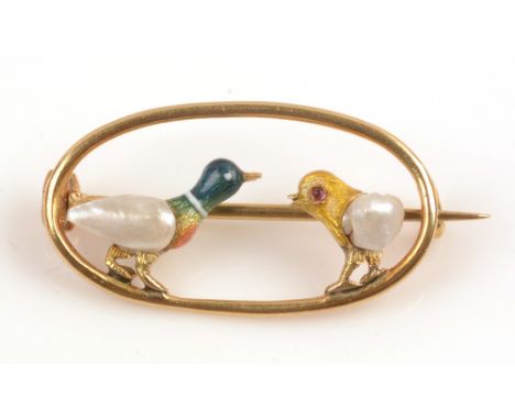 An Edwardian brooch, decorated with a duck and chick, with blister pearl bodies and enamel heads, the chick with ruby cabocho