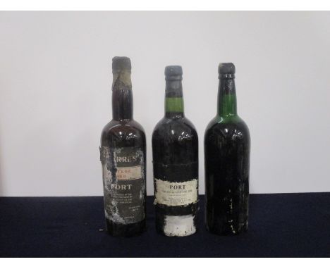 1 bt Warre's 1950 Vintage Port ms, damaged wax bs/cdl/pt dis 1 bt Grahams 1955 Vintage Port shipped and bottled by Charles Ki