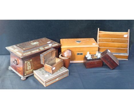 A REGENCY MOTHER OF PEARL INLAID ROSEWOOD SARCOPHAGUS-SHAPED TEA CADDY(a/f) a fitted box containing bottles (incomplete), an 
