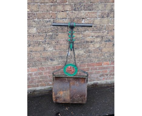 AN ANTIQUE CAST-IRON GARDEN ROLLERof small size, with Lion motif, probably Harding Brothers, the roller 41cm wide