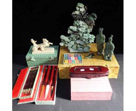 A QUANTITY OF CHINESE SOUVENIR ITEMSincluding a carved jade floral panel (a/f) and paint brushes. (8)