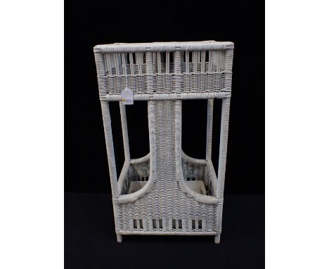 A SECCESSIONIST STYLE RATTAN STICK STANDwith tin drip tray, painted white 38cm wide