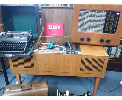 A 1960s HMV 'STEREOMASTER' 2330in teak case 96cm wide, with manual, a PYE walnut cased wireless, a vintage Singer sewing mach