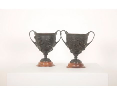 A PAIR OF BRONZE URNS WITH SCROLLED HANDLESmid-19th century, possibly Elkington & Co. (without stamp), replicas of the classi
