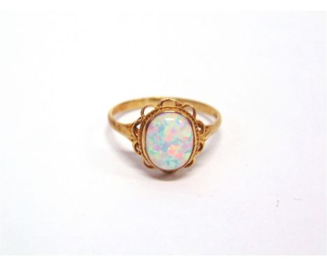 A 9 CARAT GOLD SYNTHETIC OPAL SINGLE STONE RING finger size R1/2, 1.9g gross