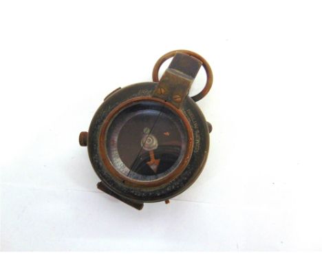 A BRITISH MILITARY SERVICE ISSUE COMPASS dated 1917 (serial no. 111178).