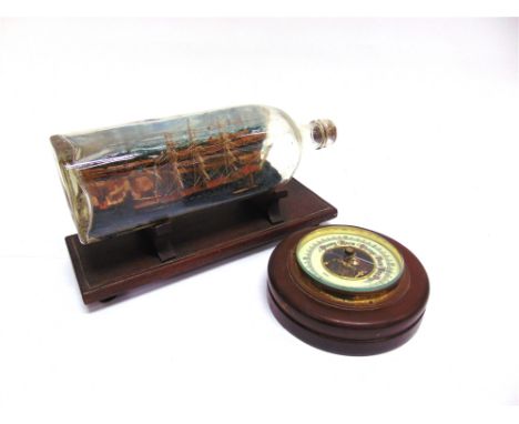 A SHIP IN A BOTTLE possibly the S.S. Great Britain with Hotwells, Bristol beyond, in a Walker's Kilmarnock Whisky bottle, 26c