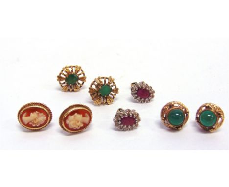A PAIR OF RUBY AND SINGLE CUT DIAMOND CLUSTER EAR STUDS stamped 'K9'; with three other ear studs; 9.2g gross