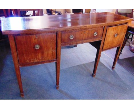 A MAHOGANY BOW FRONT SIDEBOARD  fitted with drawer flanked by cupboard on square tapering supports, 165cm wide 55cm deep 89cm