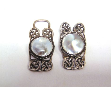 AN ARTS & CRAFTS TWO PIECE MOTHER OF PEARL BUCKLE  the circular panels 1.2cm in diameter, to a mount with Celtic entrelac dec