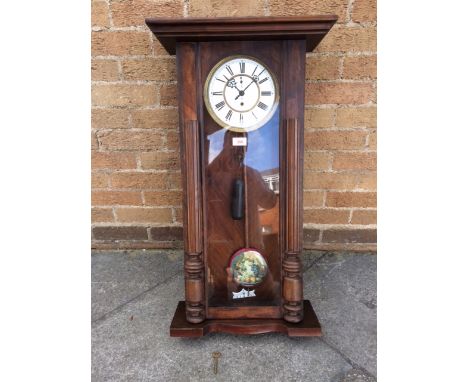 A 19TH CENTURY GUSTAV BECKER CONTINENTAL WALL CLOCK  with single weight driven movement, the enamel dial with subsidiary seco