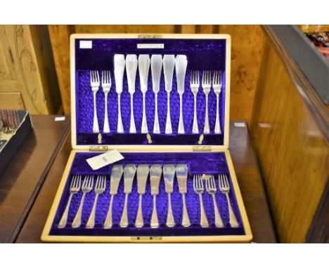 A cased set of silver fish knives & forks Joseph Rodgers & Sons, Sheffield, 1905, twelve settings (one fork missing), comes i