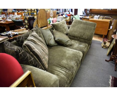 A very large contemporary dark grey chenille sofa with scatter cushions and matching foorstool.£250-350