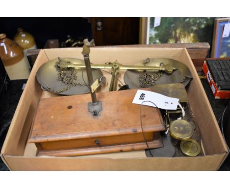A Spanish brass and wooden gold balance scale on a box base with single drawer and near-complete wooden cased set of 2g-20g w