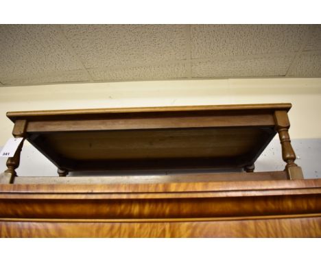 A coffee table with shelf.