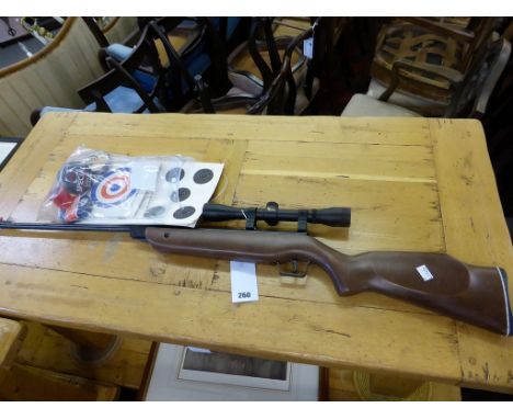 A Cometa .22 cal air rifle with Tasco scope + targets and pellets 11ft/lbs, 2.8 kg, 105cm long, beech stock. Certificate not 