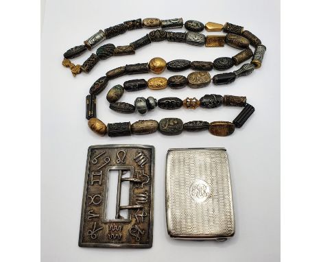 A silver vesta case, initialed, and with engine turned decoration, a silver coloured metal buckle, and similar necklace (3)