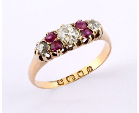 An 18ct gold, ruby and diamond ring, ring size O 