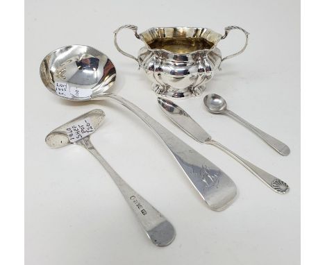 A Victorian silver Old English pattern sauce ladle, London 1865, a salt and spoon, a baby's push and a butter knife, 4.3 ozt 