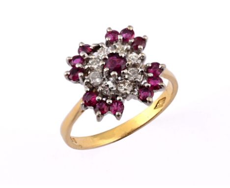 An 18ct gold, ruby and diamond cluster ring, ring size O 