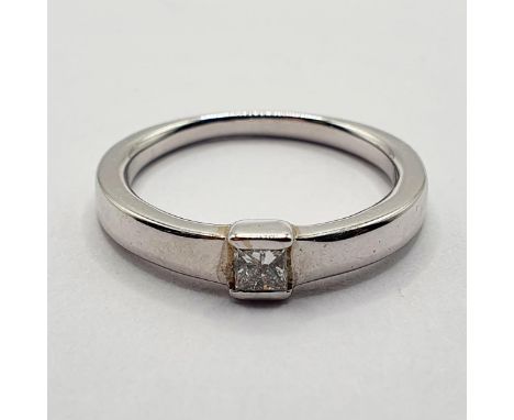 A white gold and square cut diamond ring, ring size K 1/2 