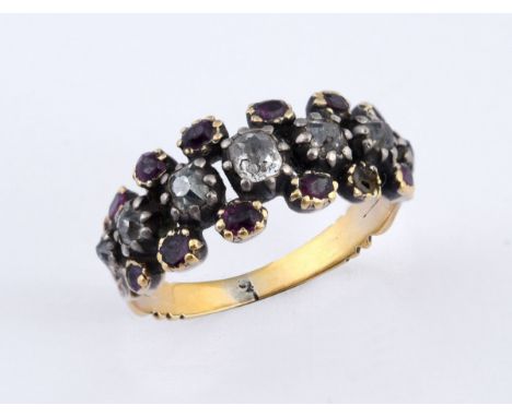 An antique yellow metal, diamond and ruby ring, ring size N 