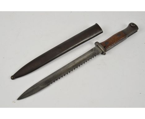 A WWI German 84/98 sawback bayonet,  by Erfurt, serial 9795, blade 24.5cm long, complete with steel scabbard (2)