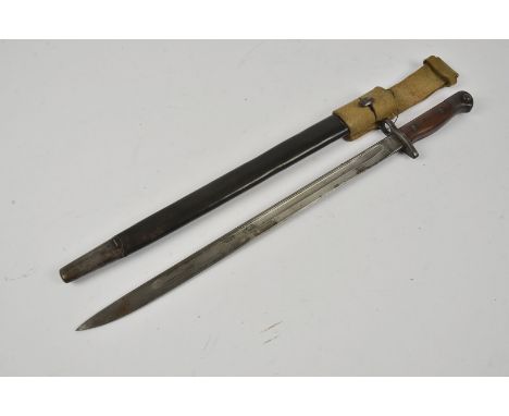 A British 1907 Pattern bayonet by Wilkinson, marked 8 '15, complete with leather and steel scabbard and frog (2)