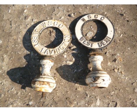 1950s Finger Post Circular Village Name Signs, two cast iron WSCC pierced circular signs, both with socles, West Dean and Wes