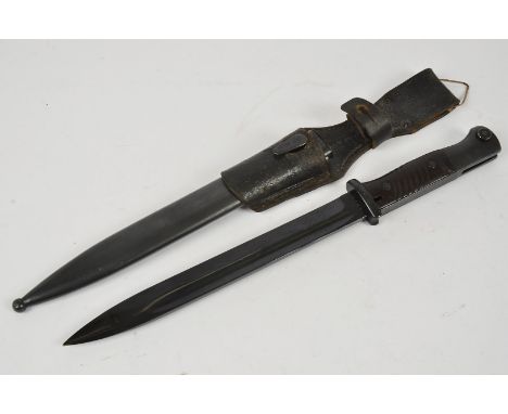 A German K98 ASW bayonet, serial 6065, marked to blade ASW, small markings to end of handle, together with steel scabbard and