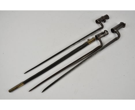 Three socket bayonets, one having leather and brass scabbard (4)