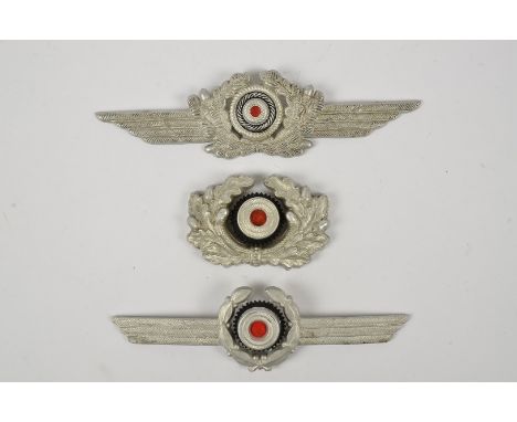Three Army Heer Cockades, the smaller one marked to back 'GES GESCH' (3)