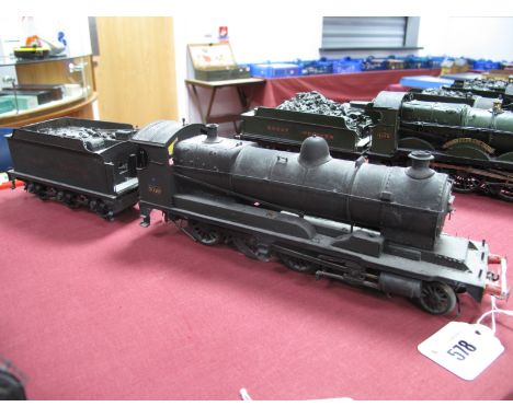 A 7mm "0" Gauge Static Brass Built Kit of a 2-8-0 Austerity locomotive and tender, finished in Great Western, R/No 3016, sign