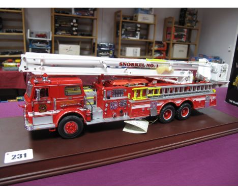 A Franklin Mint 1:32nd Scale Diecast Model Outline American Pierce Snorkel No.1 Fire Engine, presented on a wooden display pl