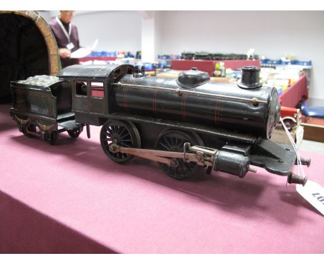 A 1930's Marklin Gauge 0-4-0 Clockwork Locomotive and Tender, continental outline, black, R/No 1041.