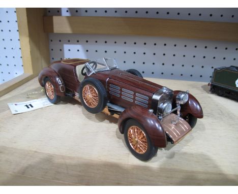 A Franklin Mint 1:24th Scale Diecast Model Hispano-Suiza Tulipwood (1924), with tag, unboxed.