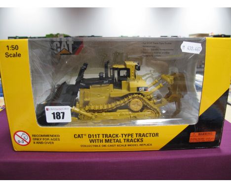 A Boxed Norscot 1:50th Scale Diecast Model #55212 CAT DIIT Track-Type Tractor, with metal tracks.