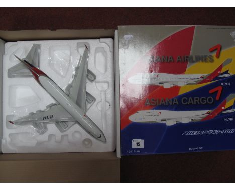 A 1:200 Scale Diecast Model of a Boeing 747, in dual livery, Asian Airlines and Asian Cargo, as new:- Boxed