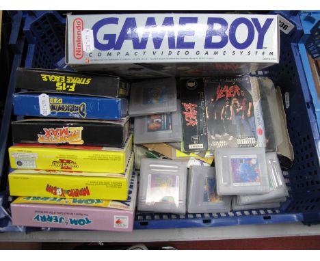 A Nintendo Game Boy Hand Held Gaming Console (Circa 1990), playworn, boxed, sixteen games including Tetris, Warioland, The Le