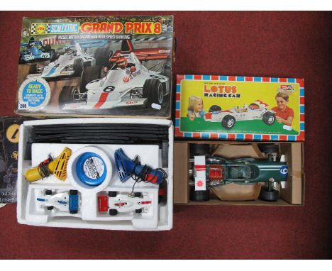 A 1970's Large Scale Battery Operated Lotus Racing Car by 'Hover'  plastic, boxed. Plus a Scalextric Grand Prix 8 set:, boxed