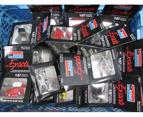 Twenty One Monogram Mini Exacts 1:87th Scale Plastic Model Cars, including Ferrari F-40, Lamborghini Countach, all boxed.