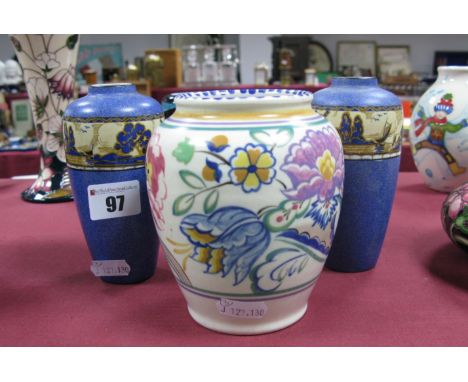 A Poole Pottery Vase, hand painted floral decoration; together with a pair of "Troy" speckled blue vases, detailed with windm