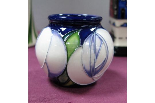 A Moorcroft Pottery Vase Painted In The White Rose Pattern By